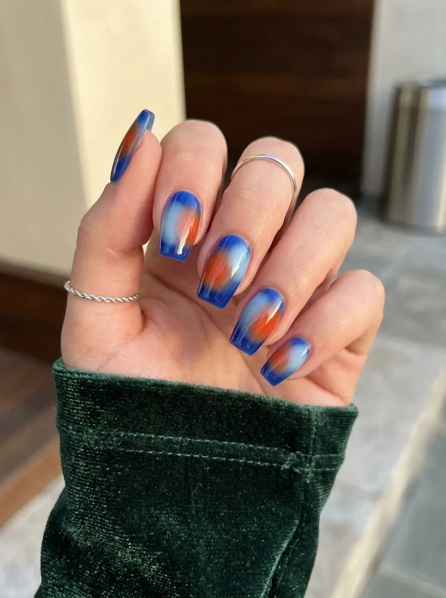 Cobalt Blue Nails With Orange Aura - Vivid cobalt blue square nails featuring a glowing warm orange aura center
