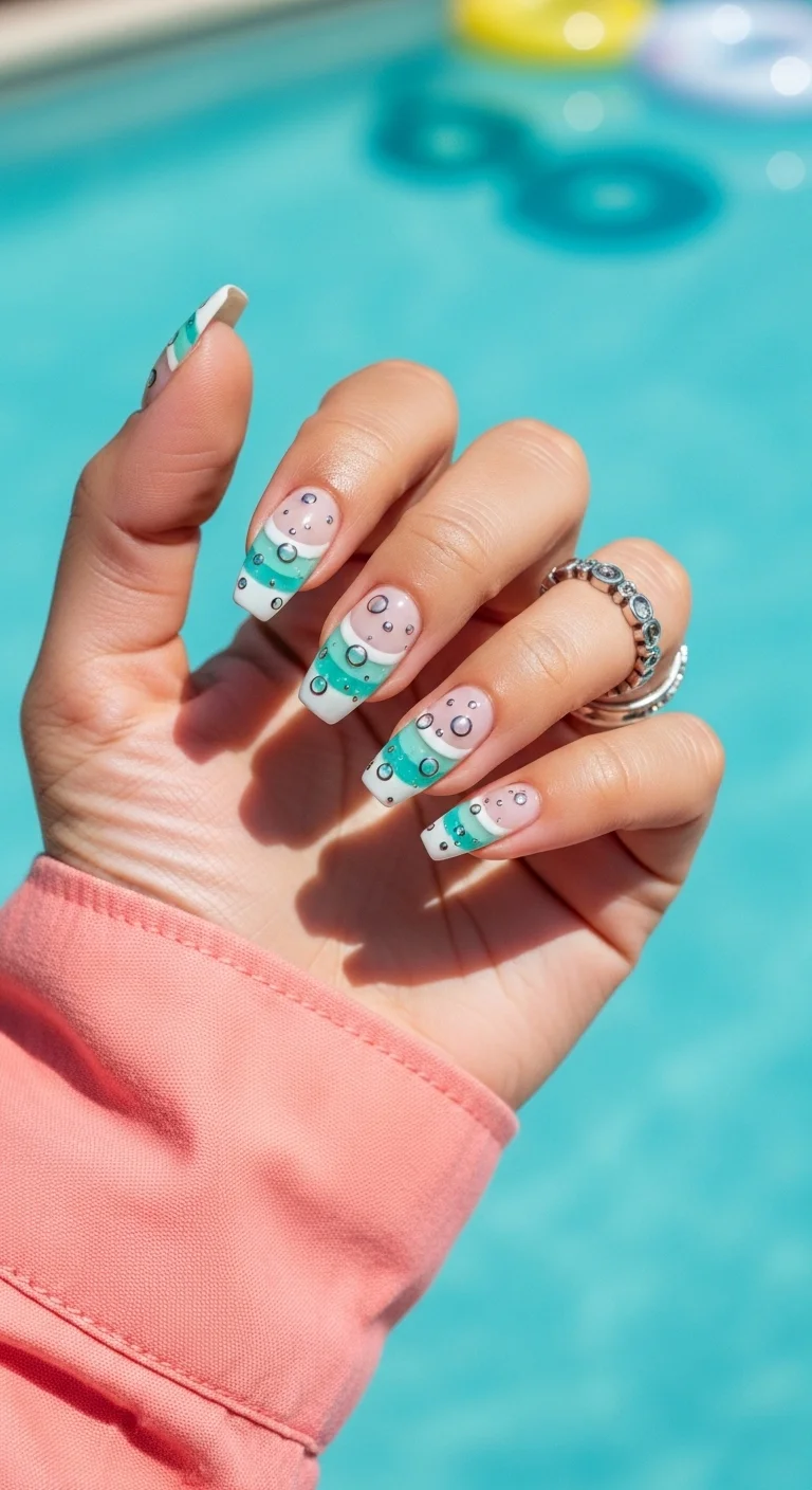 Turquoise and clear nails with bubble art and silver rings