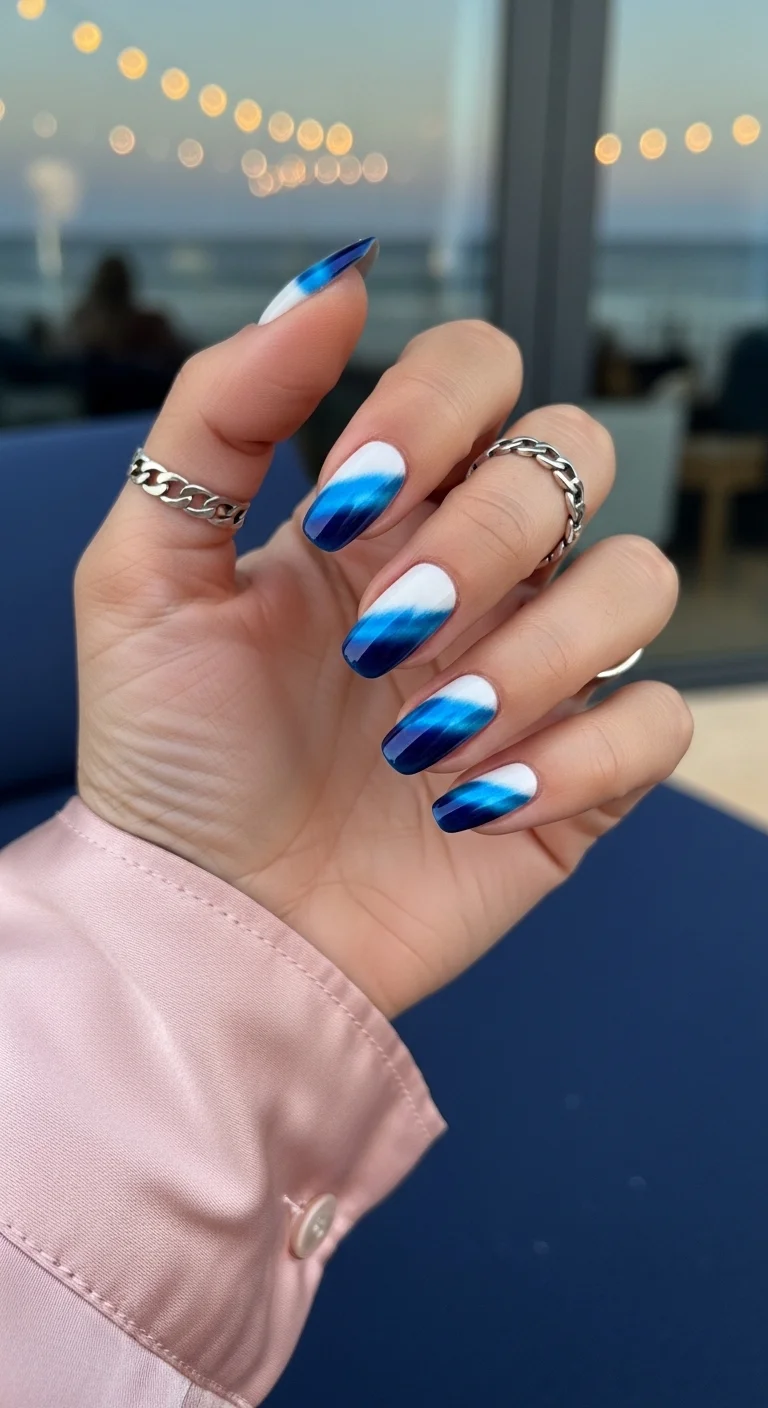 Blue cat-eye ombre nails with white base