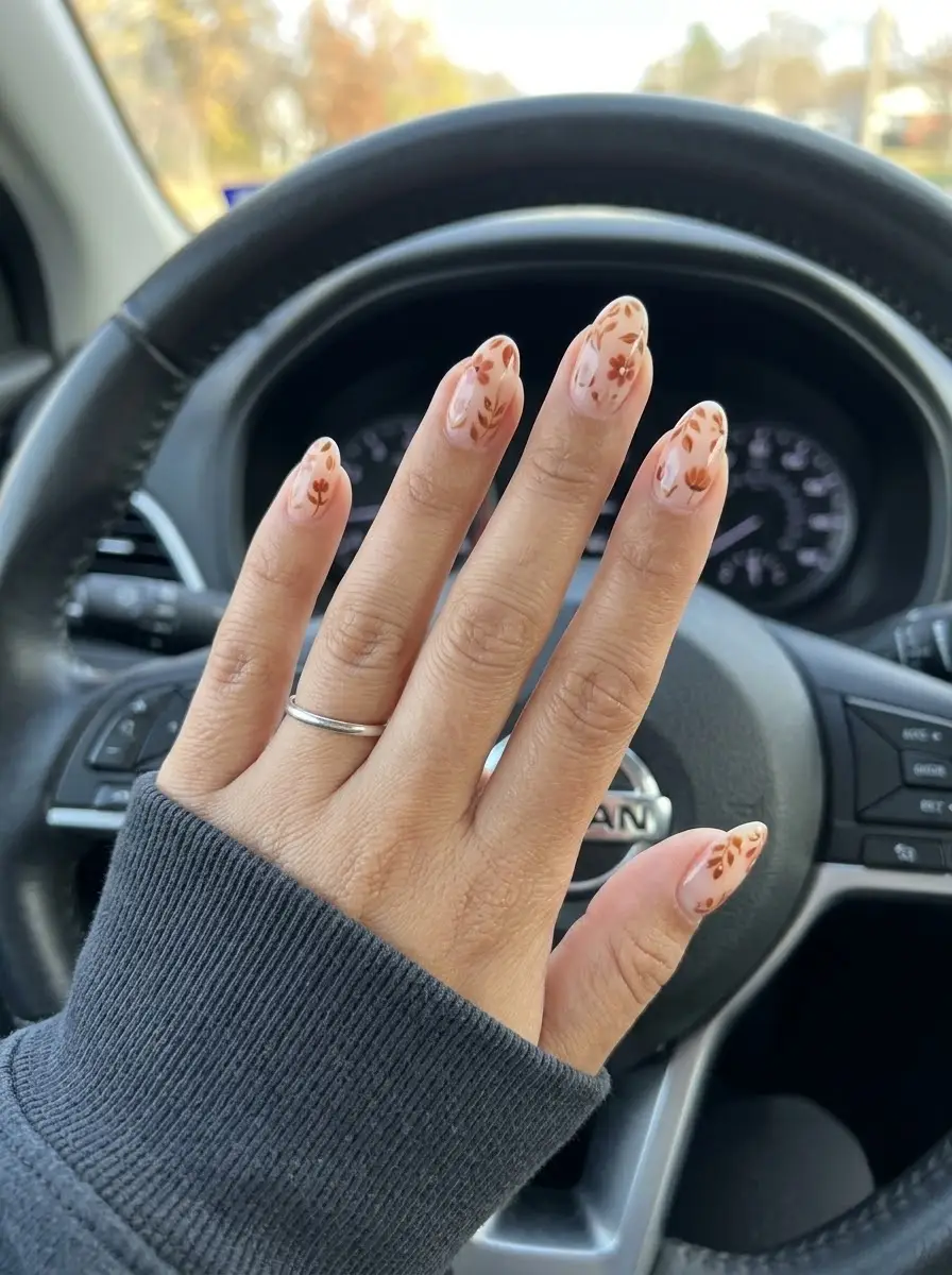 Warm Brown Botanical Christmas Short Nails - Sheer blush-nude short almond nails with delicate rust and brown hand-painted flowers