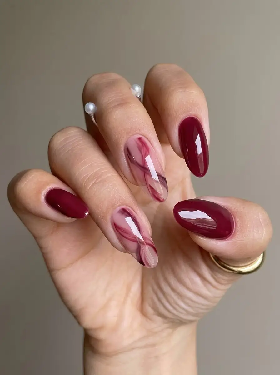 Sheer Cranberry Swirl Nails