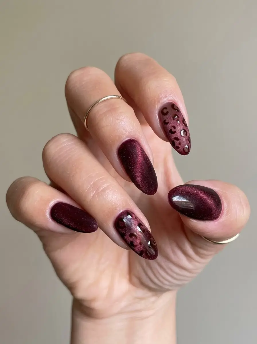 Deep Red Cat-Eye Nails with Leopard Accents
