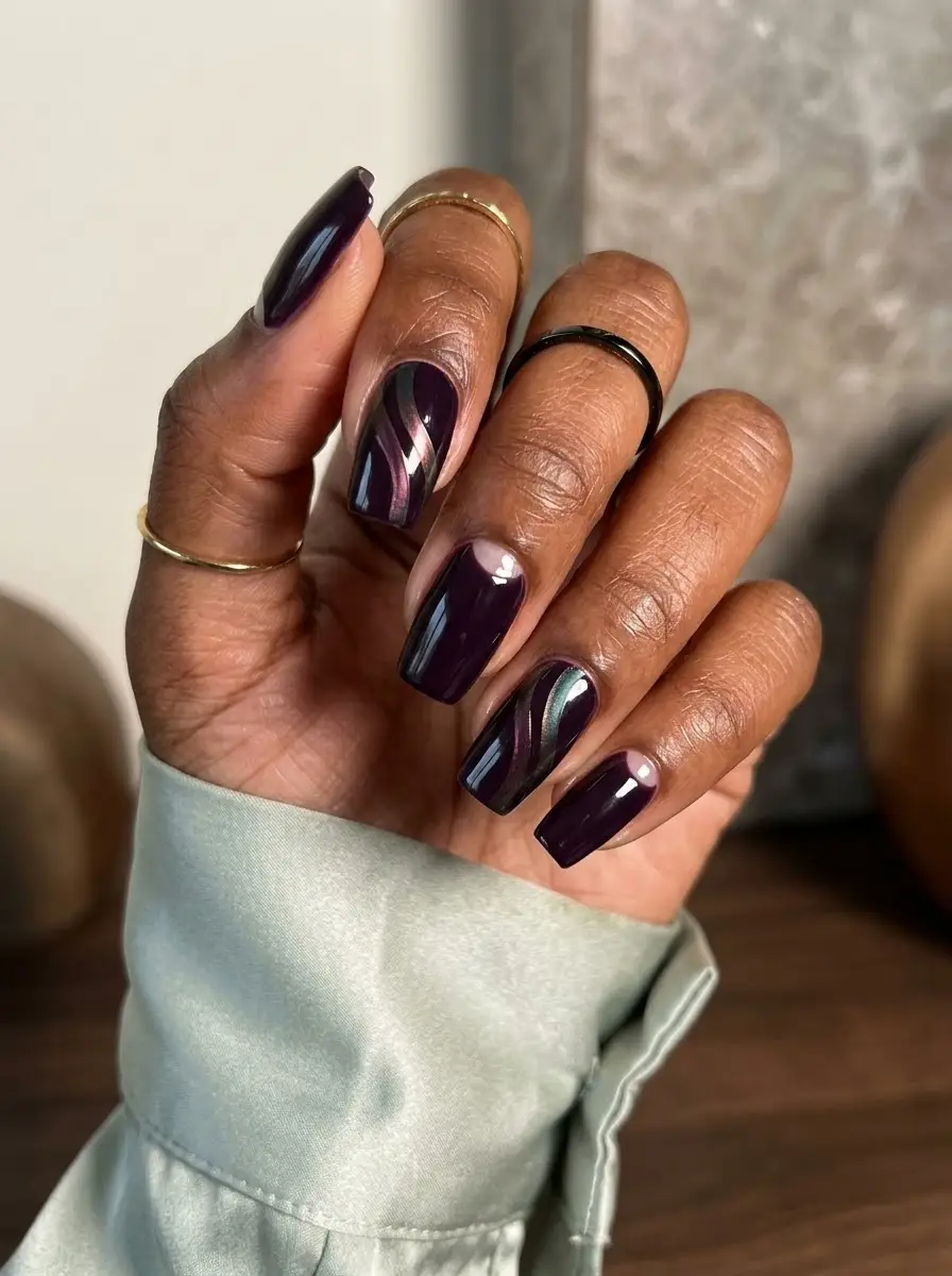 Dark Plum Swirl Accent Nails - Glossy deep plum nails styled with wavy lighter plum, lavender, and silver swirl line accents