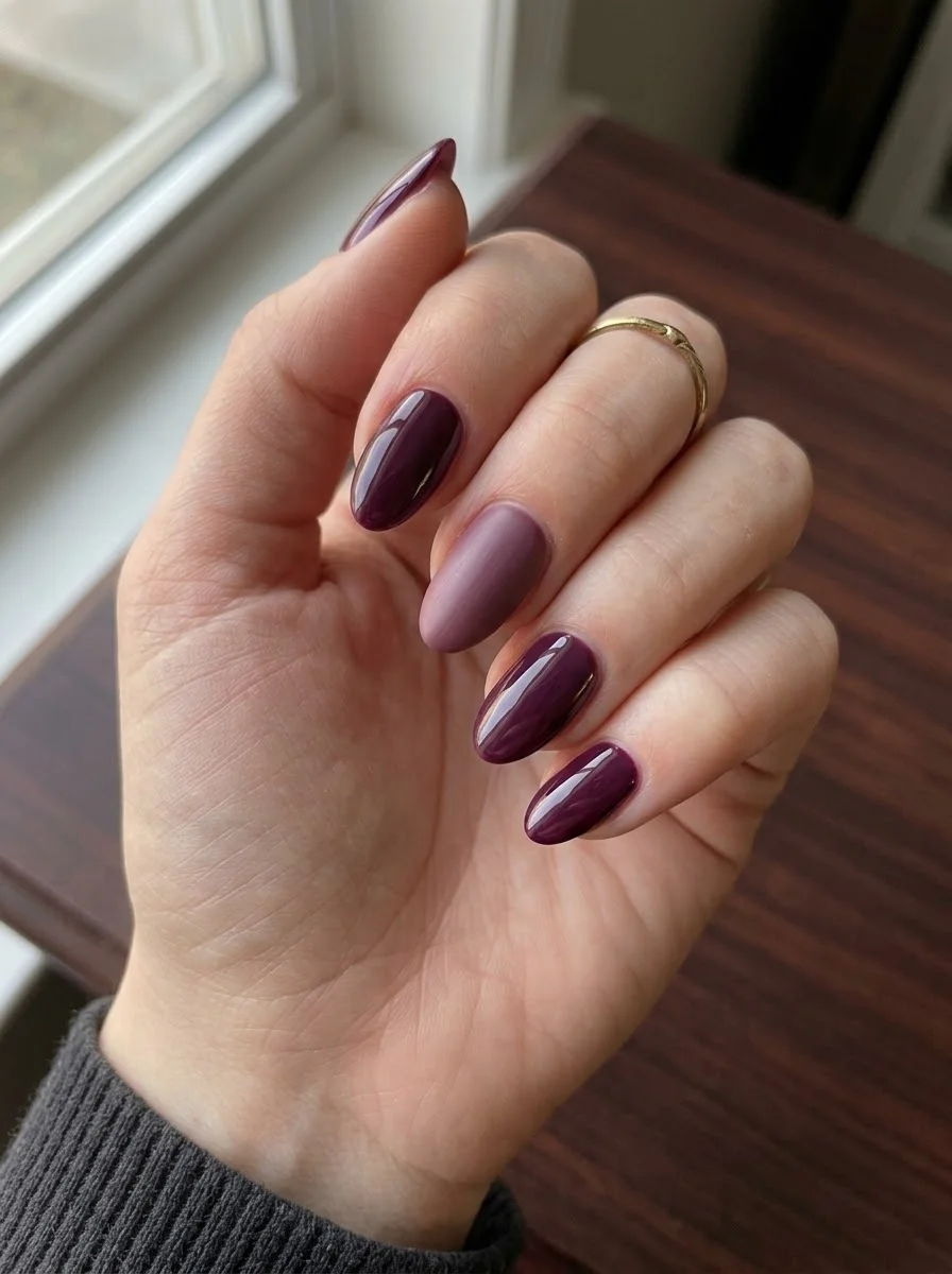 Deep berry nails with matte mauve accent