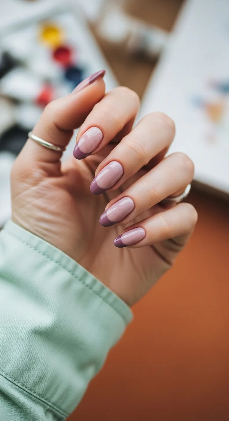 Nude nails with dusty mauve French tips