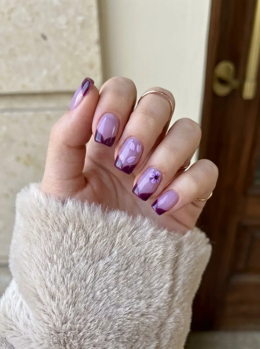 Sheer Purple Ombré Nails with Soft Floral Accents
