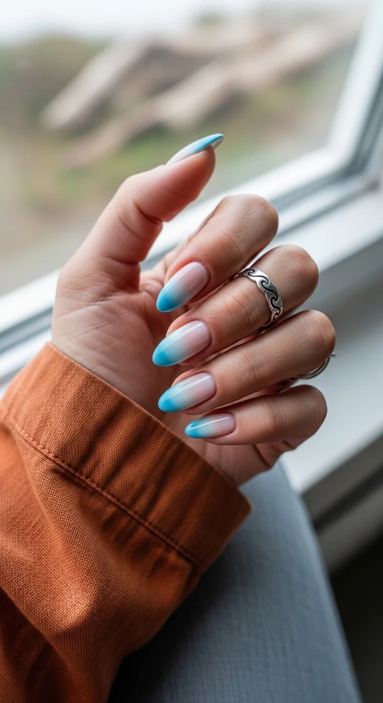 Baby blue and white ombre almond nails